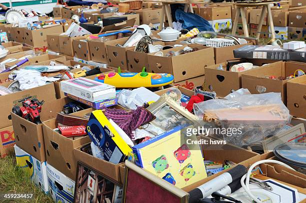 cardboard boxes with board games and dishware at flea market - second hand car stock pictures, royalty-free photos & images