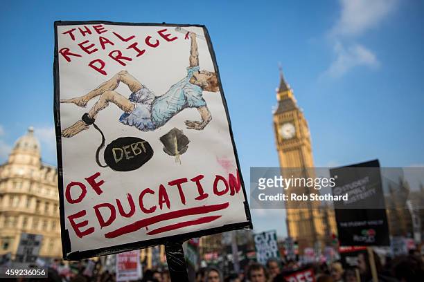 Protestors gather in Parliament Square during a march against student university fees on November 19, 2014 in London, England. A coalition of student...