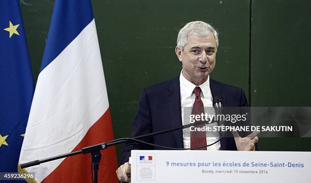 French National Assembly president Claude Bartolone gives a speech the Jean-Rostand school in Bondy, northern Paris suburb, on November 19, 2014. AFP...