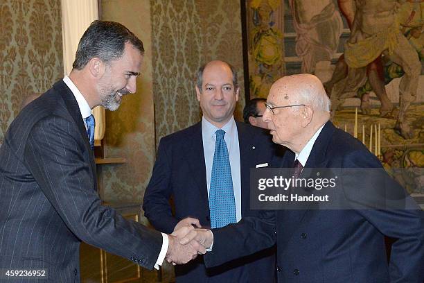 In this handout image supplied by the Press Office of the Presidency of the Republic , King Felipe of Spain meets the President of Italy Giorgio...