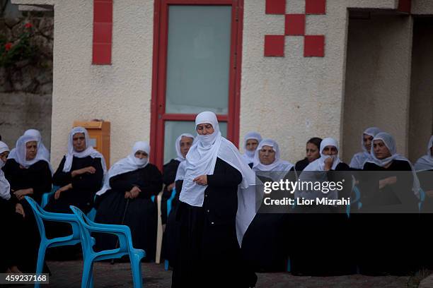 Druze women mourn during the funeral of Druze Israeli police officer Zidan Sif during his funeral on November 19, 2014 Druze village of Yanuh-Jat,...