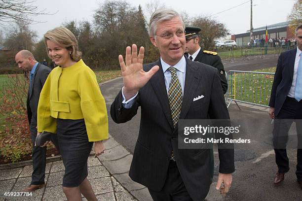 Queen Mathilde and King Philippe of Belgium visit Mathy by Bois in Couvin on November 19, 2014 in Namur, Belgium.