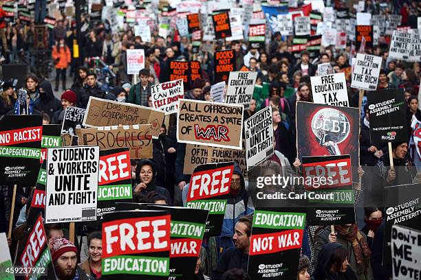 Students take part in a protest march against fees and cuts in the education system on November 19, 2014 in London, England. A coalition of student...