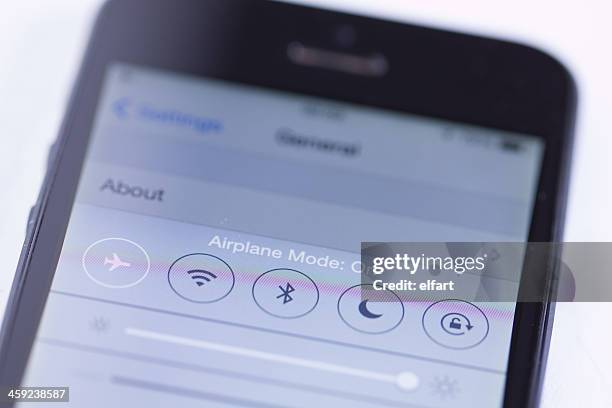 screen on apple iphone 5 and new control center - airplane mode stock pictures, royalty-free photos & images