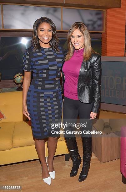 Gabrielle Union and Karla Martínez is on the Set Of "Despierta America" at Univision Headquarters on November 19, 2014 in Miami, Florida.