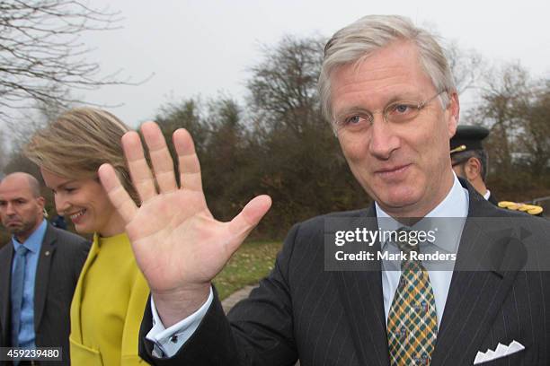 Queen Mathilde and King Philippe of Belgium visit Mathy by Bois in Couvin on November 19, 2014 in Namur, Belgium.