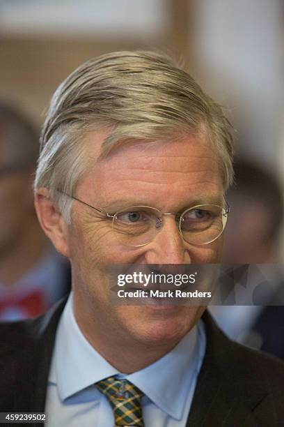 King Philippe of Belgium visits Mathy by Bois in Couvin on November 19, 2014 in Namur, Belgium.