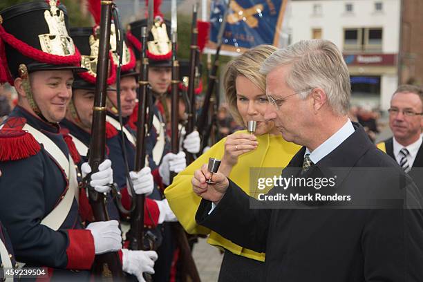 Queen Mathilde and King Philippe of Belgium visit Cerfontaine on November 19, 2014 in Namur, Belgium.