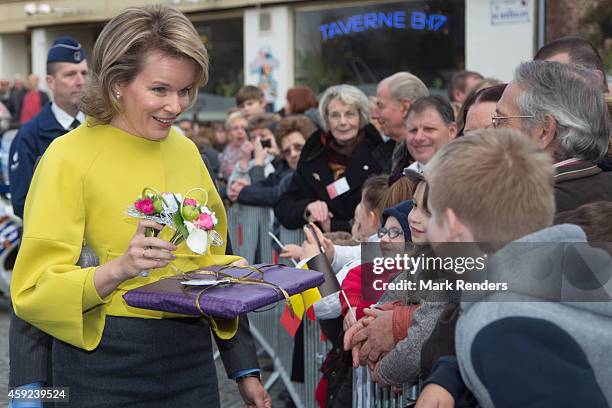 Queen Mathilde of Belgium visits Cerfontaine on November 19, 2014 in Namur, Belgium.