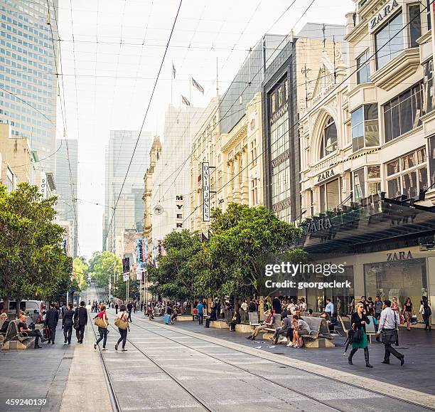 people on bourke street in central melbourne - bourke street stock pictures, royalty-free photos & images