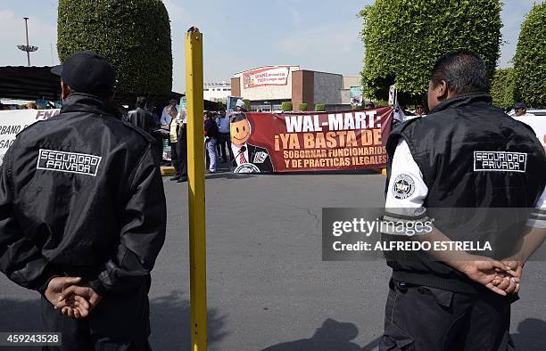 Members of civil associations "Red Mexicana contra la Inmunidad de Walmart" and "Frente del Pueblo" hold a protest in front of US giant Walmart...