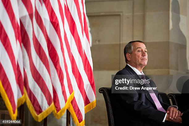 Speaker of the House John Boehner looks on during a dedication ceremony for a bust of the late Czech leader Vaclav Havel on Capitol Hill, November...