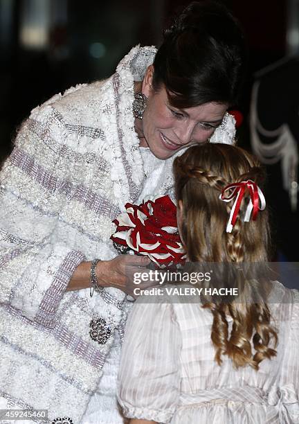 Princess Caroline of Hanover arrives for a gala during celebrations marking Monaco's National Day in Monaco on November 19, 2014. AFP PHOTO / POOL /...