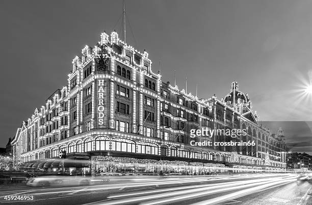 london, harrods department stores at night in black & white - harrods stock pictures, royalty-free photos & images