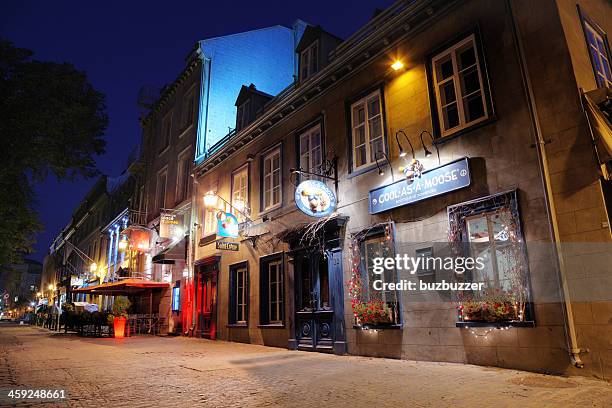 colorful old quebec city alley at night - buzbuzzer stock pictures, royalty-free photos & images