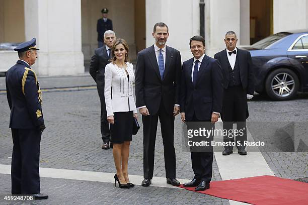 Italian Prime Minister Matteo Renzi stands with Queen Letitia of Spain and King Felipe of Spain pose for a picture at Palazzo Chigi during the...
