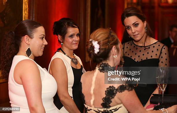 Catherine, Duchess of Cambridge meets attendees at the Place2Be Wellbeing in Schools Awards Reception at Kensington Palace on November 19, 2014 in...