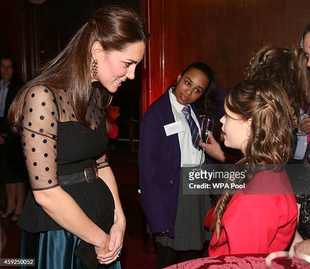 Catherine, Duchess of Cambridge meets a finalist in the child champion award, Georgia Alvey, from Cotsford Junior school in County Durham at the...