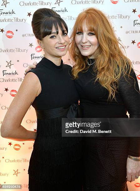 Gizzie Erskine and Charlotte Tilbury attend the launch of Charlotte Tilbury's 'Backstage Beauty Booth' counter in the Beauty Hall at Fenwick Of Bond...
