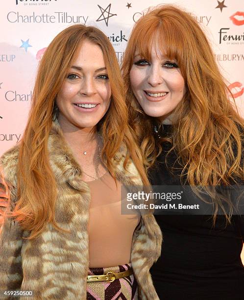 Lindsay Lohan and Charlotte Tilbury attend the launch of Charlotte Tilbury's 'Backstage Beauty Booth' counter in the Beauty Hall at Fenwick Of Bond...