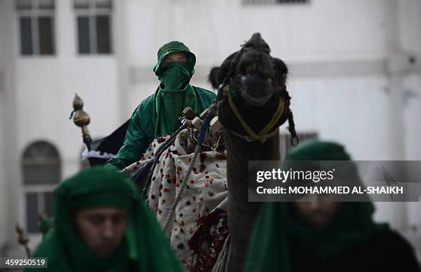 Bahraini Shiite Muslims take part in the Arbaeen religious festival which marks the 40th day after Ashura commemorating the seventh century killing...