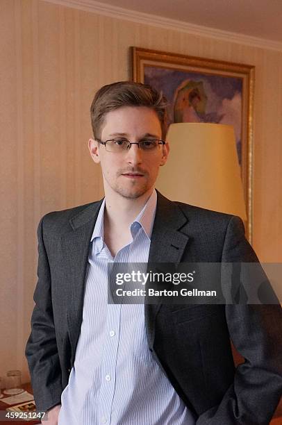 Former intelligence contractor Edward Snowden poses for a photo during an interview in an undisclosed location in December 2013 in Moscow, Russia....