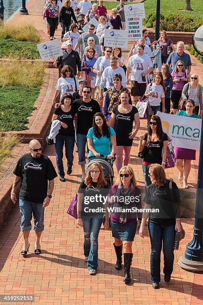 walk a mile in her shoes--event against domestic violence - frederick bildbanksfoton och bilder