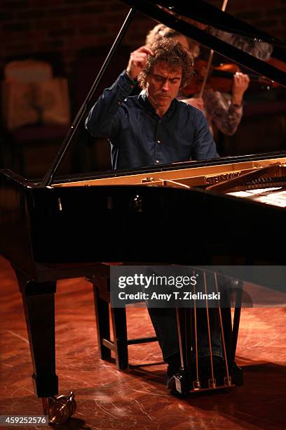 English Pianist Paul Lewis rehearses the Mozart 'Piano Concerto No 12 in A, K414' with The Britten Sinfonia before the Turner Sims 40th Anniversary...