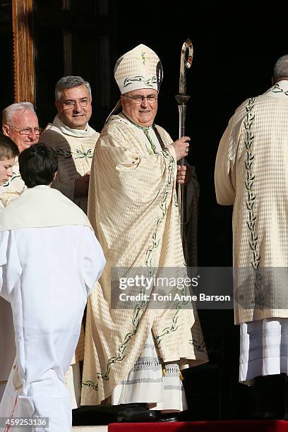 Bernard Barsi, Archeveque of Monaco welcomes guests at the Cathedral of Monaco after a mass during the official ceremonies for the Monaco National...