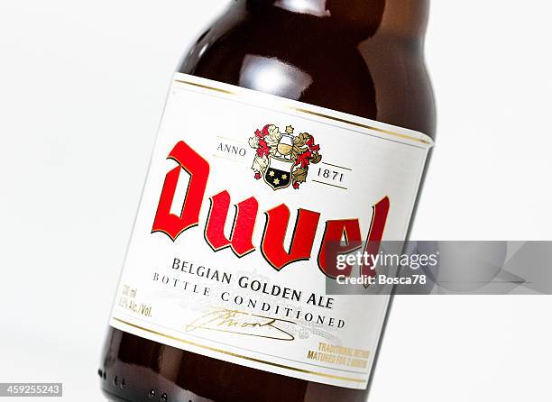 belgian duvel beer bottle - belgium beer stock pictures, royalty-free photos & images