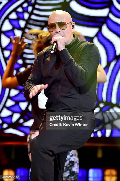 Rapper Pitbull performs onstage during rehearsals for the 15th annual Latin GRAMMY Awards at the MGM Grand Garden Arena on November 19, 2014 in Las...