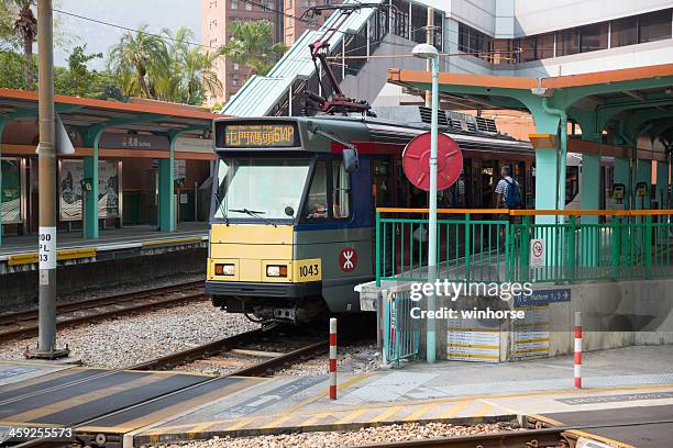 light rail transit (lrt) in hong kong - tuen mun stock pictures, royalty-free photos & images