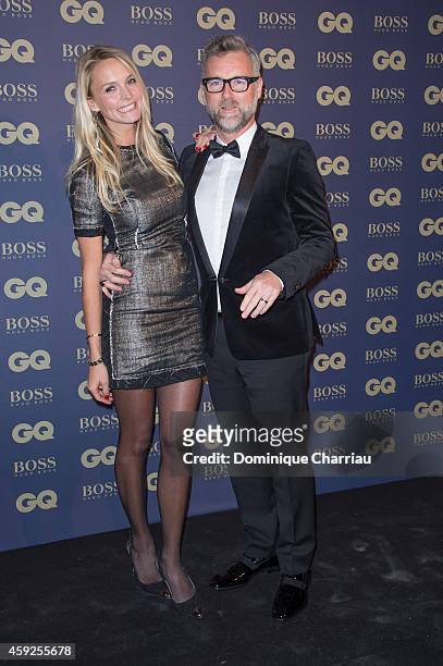Darren Tulett and guest attends the GQ Men Of The Year Awards 2014 Photocall In Paris at Musee d'Orsay on November 19, 2014 in Paris, France.
