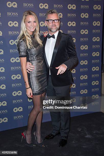 Darren Tulett and guest attends the GQ Men Of The Year Awards 2014 Photocall In Paris at Musee d'Orsay on November 19, 2014 in Paris, France.