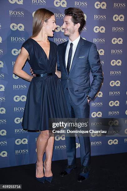 Pierre Ninet and Natasha Andrews attend the GQ Men Of The Year Awards 2014 Photocall In Paris at Musee d'Orsay on November 19, 2014 in Paris, France.