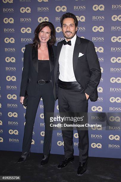 Vincent Elbaz and guest attend the GQ Men Of The Year Awards 2014 Photocall In Paris at Musee d'Orsay on November 19, 2014 in Paris, France.