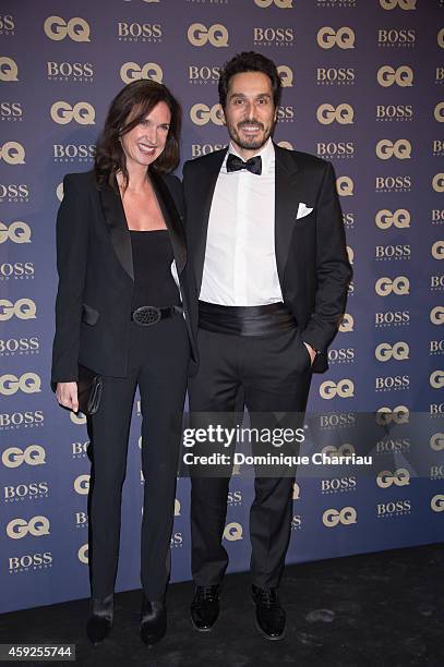 Vincent Elbaz and guest attend the GQ Men Of The Year Awards 2014 Photocall In Paris at Musee d'Orsay on November 19, 2014 in Paris, France.