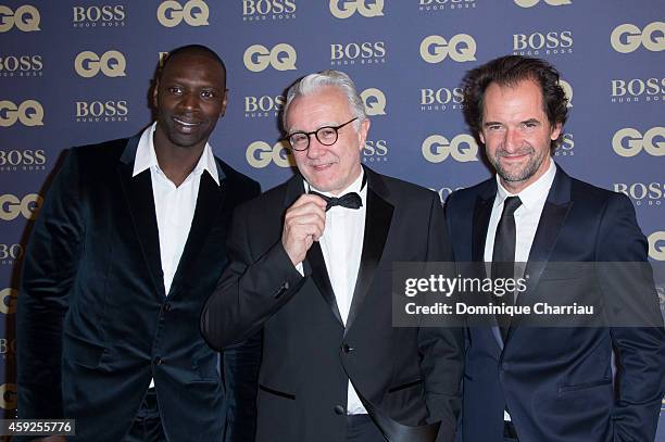 Omar Sy, Alain Ducasse and Stphane De Groodt attend the GQ Men Of The Year Awards 2014 Photocall In Paris at Musee d'Orsay on November 19, 2014 in...