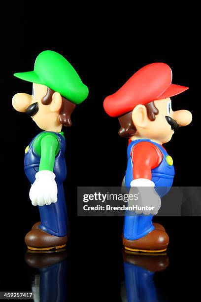 brothers backs - super mario stockfoto's en -beelden