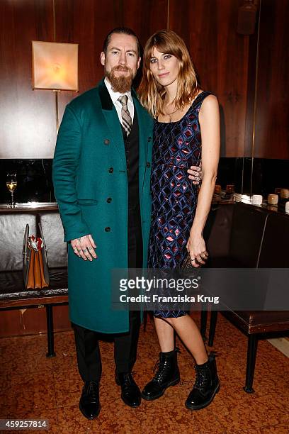 Justin O'Shea and Veronika Heilbrunner attend the mytheresa.com X Burberry Dinner on November 19, 2014 in Munich, Germany.