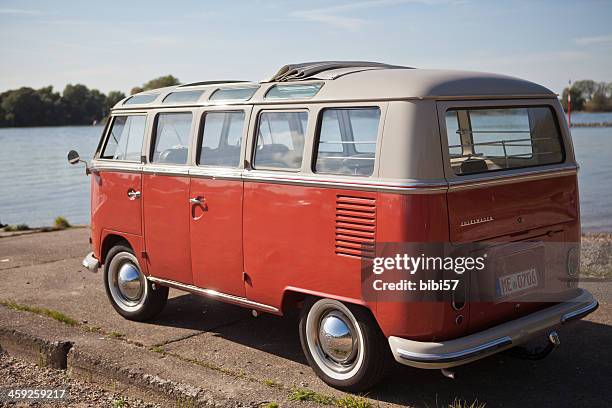 vw minibus at the rhine river - mini van stock pictures, royalty-free photos & images