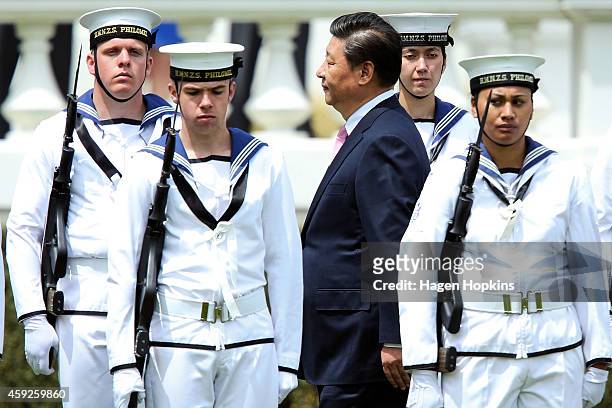 President Xi Jinping of China inspects the guard of honour during a State Welcome at Government House on November 20, 2014 in Wellington, New...