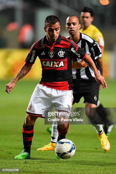 Diego Tardelli of Atletico MG and Canteros of Flamengo battle for the ball during a match between Atletico MG and Flamengo as part of Brasileirao...