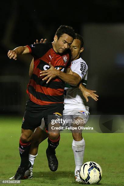 Juan of Vitoria battles for the ball withn Carlinhos of Coritiba during the match between Vitoria and Coritiba as part of Brasileirao Series A 2014...