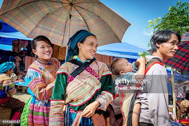 flower hmong women at market - hill tribes stock pictures, royalty-free photos & images