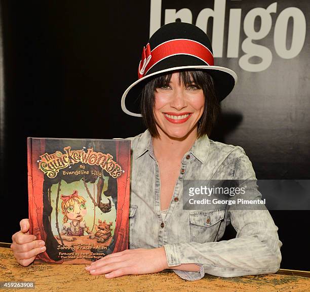 Evangeline Lilly signs copies of her new book "The Squickerwonkers" at Indigo Manulife Centre on November 19, 2014 in Toronto, Canada.
