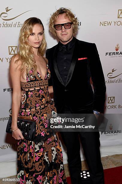 Model Natasha Poly and Design Peter Dundas attend The New York Ball: The 20th Anniversary Benefit For The European School Of Economics at Trump Tower...