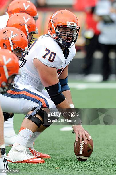 Luke Bowanko of the Virginia Cavaliers lines up at the line of scrimmage against the Maryland Terrapins at Byrd Stadium on October 12, 2013 in...