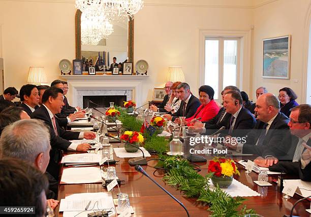 Prime Minister John Key and The President of the People's Republic of China, Xi Jinping talk during a bilateral meeting at Premier House on November...