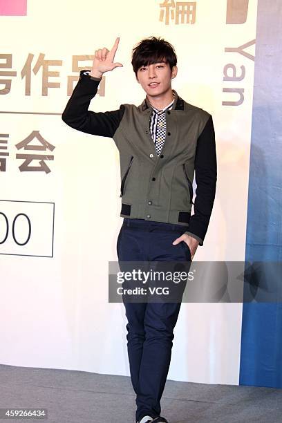 Singer Aaron Yan attends sighing event of his new album "Cut" on November 20, 2014 in Shanghai, China.